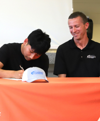  GISH registered apprentice student signing agreement to apprentice with Anderson Ford.