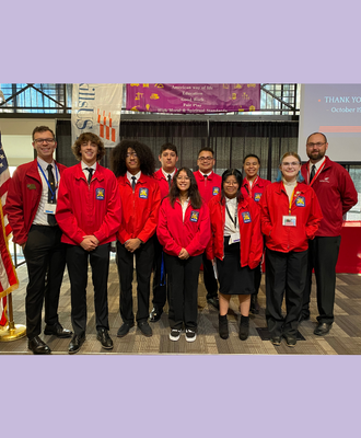  Picture of 8 GISH students in red SkillsUSA blazers smiling and standing with two teachers