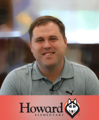  Smiling headshot of Jason Weseman with the Howard logo